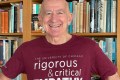 Lou wearing a rigorous and critical empathy t-shirt, courtesy of Xavier Ramey and the UChicago Community outreach