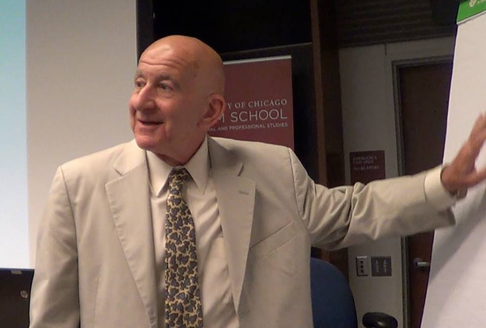 This image has an empty alt attribute; its file name is imageofloupointingatgrahamschooltalk.jpg