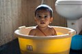 a boy in a bathtub - image the child is the soul